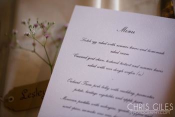 ornate-table-menu-at-a-barn-wedding